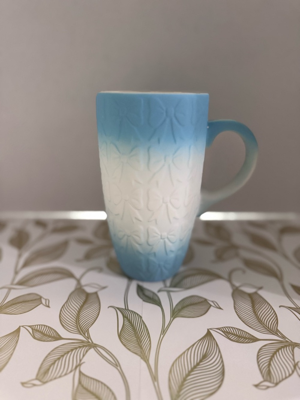 Petal & Pearl Blue to White Ombre Bow Textured Mug